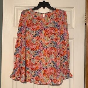 Boutique top, size large. NWOT, never worn. Lightweight 100% polyester.